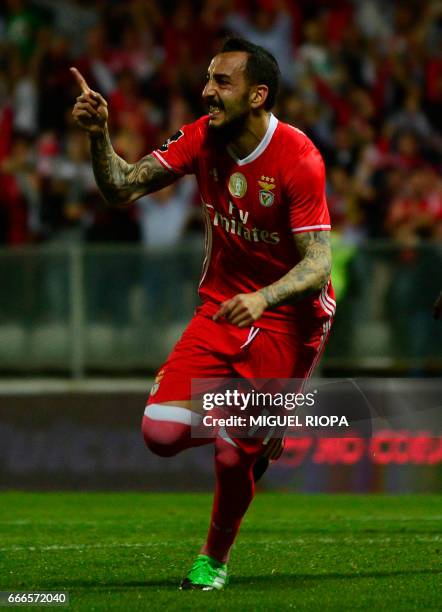 Benfica's Greek forward Konstantinos Mitroglou celebrates after scoring a goal during the Portuguese league football match Moreirense vs SL Benfica...