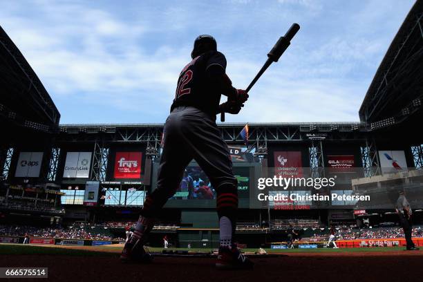 Francisco Lindor of the Cleveland Indians warms up on deck during the first inning of the MLB game against the Arizona Diamondbacks at Chase Field on...