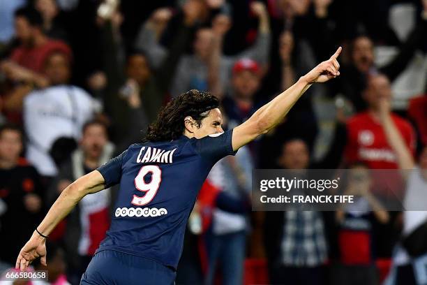 Paris Saint-Germain's Uruguayan forward Edinson Cavani celebrates after scoring a goal during the French L1 football match between Paris...