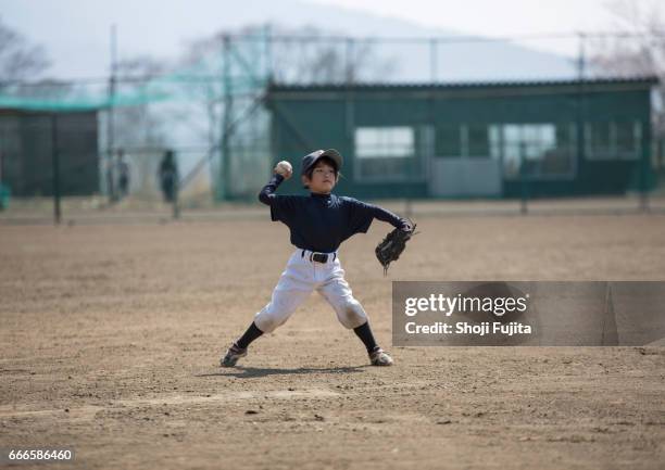 youth baseball players,defensive practice - girl baseball cap stock pictures, royalty-free photos & images