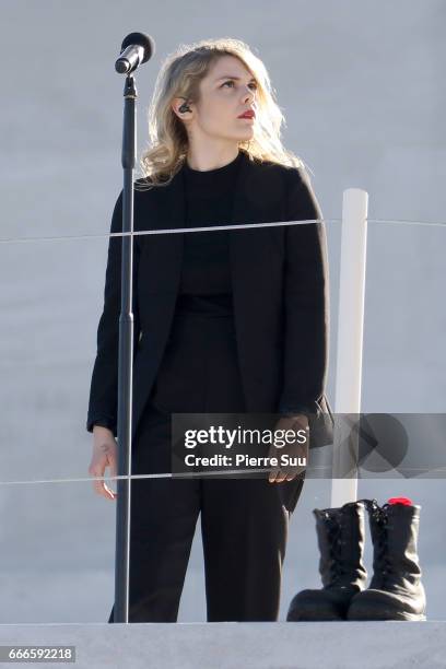 Singer Beatrice Martin from the band 'Coeur De Pirate'perfors at the centenary commemorative service at the Canadian National Vimy Memorial on April...