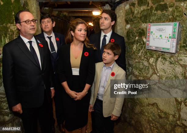Sophie Trudeau, Xavier Trudeau, Prime Minister of Canada, Justin Trudeau, French President Francois Hollande walk through a tunnel made during WWI...