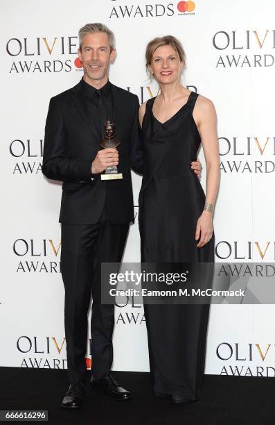 Crystal Pite and Jonathon Young with the award for Best New Dance Production for Betroffenheit poses in the winners room at The Olivier Awards 2017...