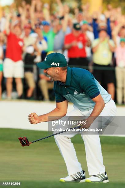 Sergio Garcia of Spain celebrates after defeating Justin Rose of England on the first playoff hole during the final round of the 2017 Masters...