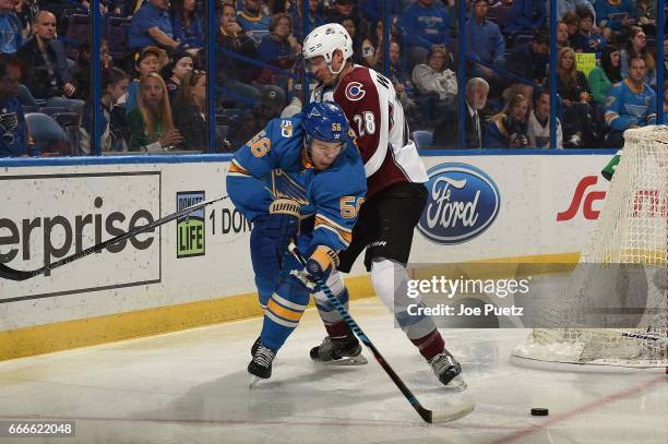 Patrick Wiercioch of the Colorado Avalanche defends against Magnus Paajarvi of the St. Louis Blues on April 9, 2017 at Scottrade Center in St. Louis,...