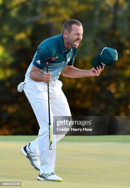 Sergio Garcia of Spain celebrates after defeating Justin Rose of England on the first playoff hole during the final round of the 2017 Masters...