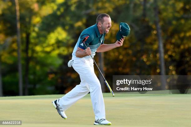 Sergio Garcia of Spain celebrates after defeating Justin Rose of England on the first playoff hole during the final round of the 2017 Masters...