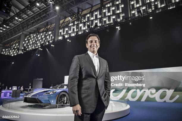 Mark Fields, president and chief executive officer of Ford Motor Co., poses for a photograph following a Bloomberg Television interview in Shanghai,...