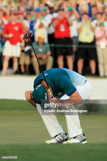 Sergio Garcia of Spain celebrates after defeating Justin Rose of England on the first playoff hole during the final round of the 2017 Masters...