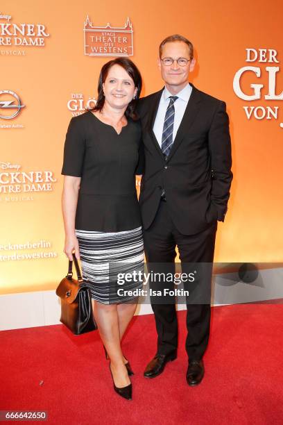 Mayor of Berlin Michael Mueller and his wife Claudia Mueller attend the premiere of the musical 'Der Gloeckner von Notre Dame' on April 9, 2017 in...