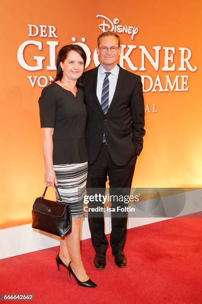 Mayor of Berlin Michael Mueller and his wife Claudia Mueller attend the premiere of the musical 'Der Gloeckner von Notre Dame' on April 9, 2017 in...