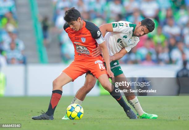 Diego de Buen of Santos and Erick Gutierrez of Pachuca fight for the ball during the 13th round match between Santos Laguna and Pachuca as part of...