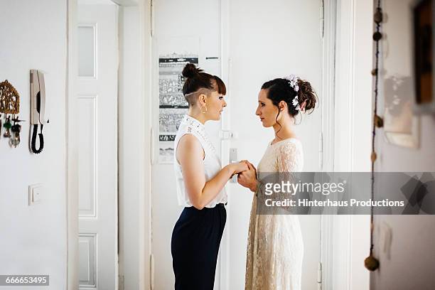 Lesbian couple getting ready for their wedding