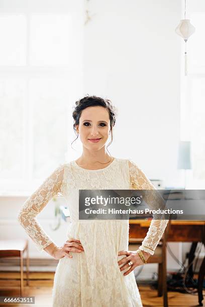 proud lesbian bride portrait - kanten jurk stockfoto's en -beelden