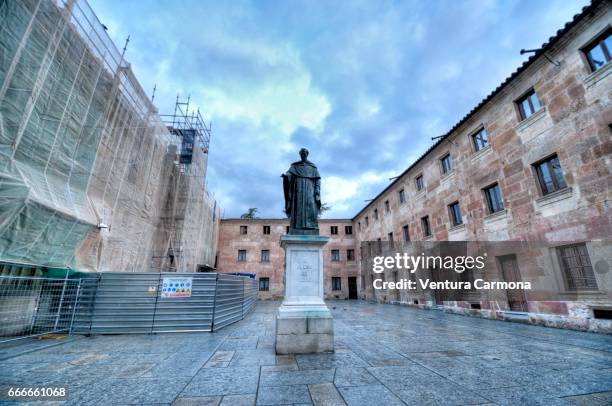 statue of fray luis de león - university of salamanca, spain - hochschulstudium stock pictures, royalty-free photos & images