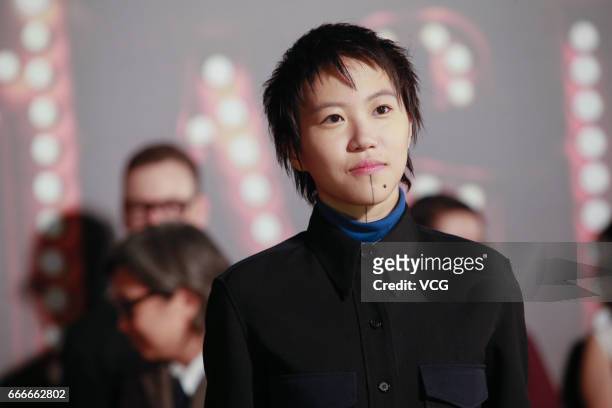 Singer Leah Dou Jingtong poses on red carpet of the 36th Hong Kong Film Awards ceremony at Hong Kong Cultural Centre on April 9, 2017 in Hong Kong,...