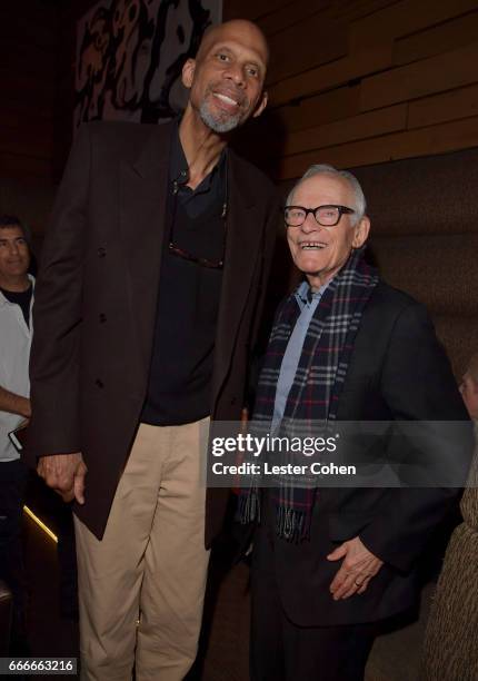 Former NBA player Kareem Abdul-Jabbar and lyricist Alan Bergman attend an evening with Quincy Jones and The Jazz Foundation of America at Vibrato on...