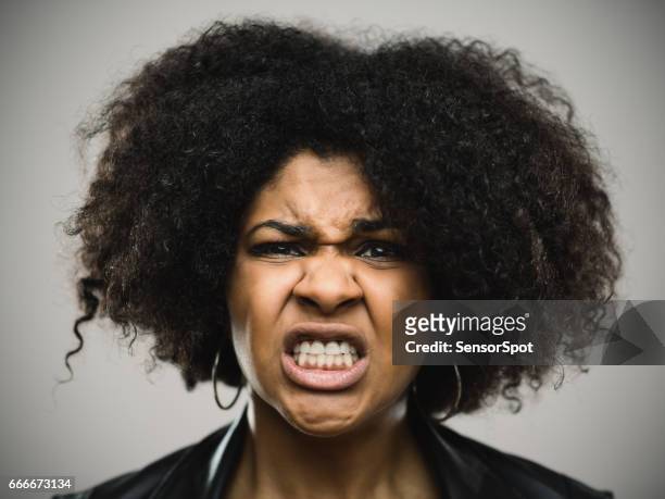 close-up portrait of furious young afro american woman - angry black woman stock pictures, royalty-free photos & images