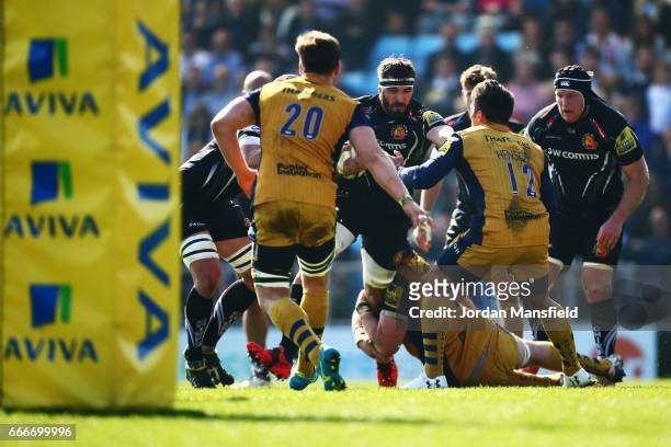 Don Armand of Exeter is tackled by James Phillips of Bristol during the Aviva Premiership match between Exeter Chiefs and Bristol Rugby at Sandy Park...