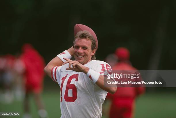 American football quarterback Joe Montana, pictured in action during training with the San Francisco 49ers at Crystal Palace prior to their game...