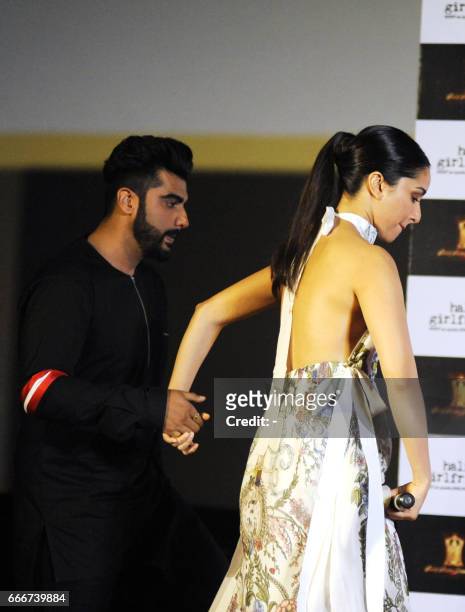 Indian Bollywood actors Shraddha Kapoor and Arjun Kapoor attend the trailer launch of the Hindi film "Half Girlfriend" in Mumbai on April 10, 2017. /...