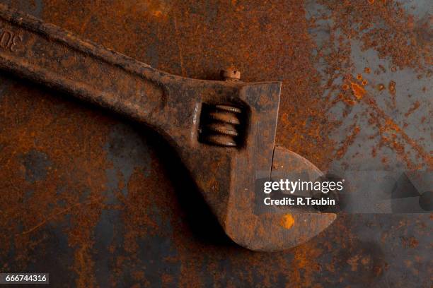 old rusty adjustable wrench tool - skiftnyckel bildbanksfoton och bilder