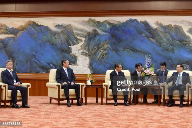 Chinese Premier Li Keqiang attends a meeting with Yohei Kono , head of the Japanese Association for the Promotion of International Trade, on April...