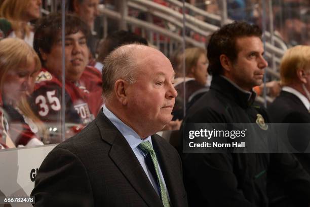 Head coach Bruce Boudreau of the Minnesota Wild looks on from the bench during a game against the Arizona Coyotes at Gila River Arena on April 8,...