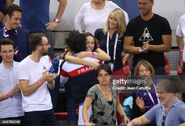 Captain of France Yannick Noah, his wife Isabelle Camus , their son Joalukas Noah following the victory 3-0 on day 2 of the Davis Cup World Group...