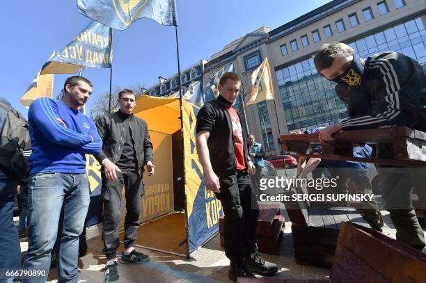 Ukrainian activist set up camp in front of the Russian owned Sberbank Bank in Kiev on April 10, 2017. Ukrainian activists declared the permanent...