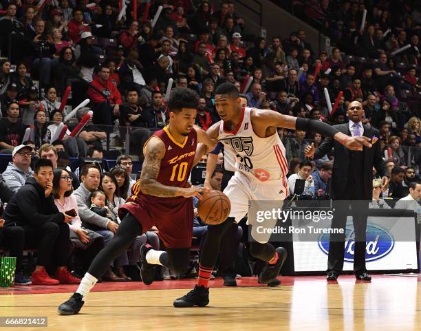 April 8 : Mike Williams of the Canton Charge drives the ball by Bruno Caboclo of the Raptors 905 at the Hershey Centre on April 8, 2017 in...