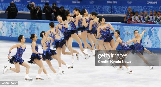 Time-elapsed photo shows Japanese figure skater Mao Asada performing a triple axel at the Sochi Olympics in February 2014. The three-time world...