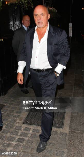 Aldo Zilli departs the birthday celebration of Gary Cockerill held at Guy Richie's pub "The Punch Bowl" on October 1, 2011 in London, England.