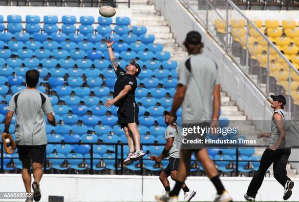 November 18, 2010: New Zealand player McCullum jumps to catch the ball as Patel, Guptil and other players try to catch it also while playing Rugby...