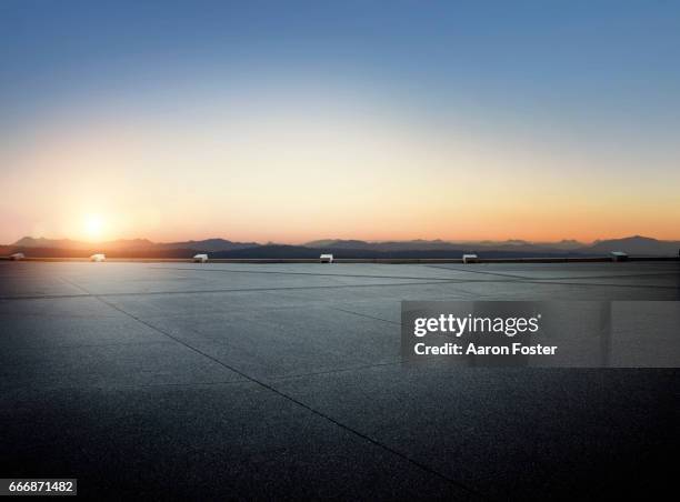 sunset parking lot - empty carpark stock pictures, royalty-free photos & images
