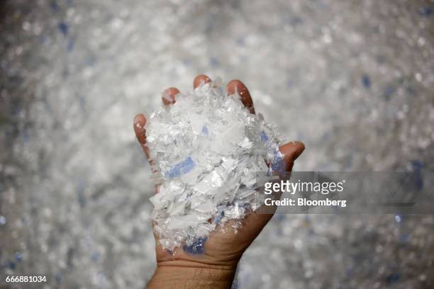Pieces of polyester are displayed for a photograph before being recycled into silver nitrate at the Rochester Silver Works LLC facility in Rochester,...