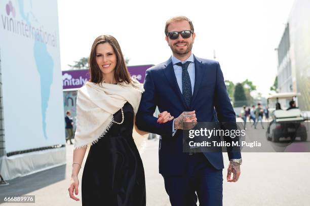 Thais Souza Wiggers and Paul Baccaglini, President of Palermo, visit Vinitaly on April 10, 2017 in Verona, Italy.