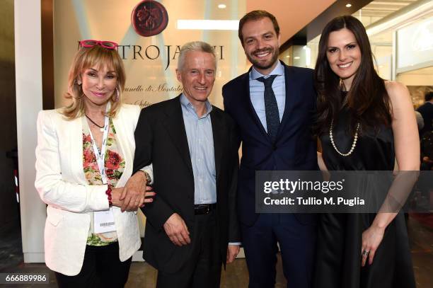 Rossana Bettini, Riccardo Illy, Paul Baccaglini, President of Palermo, and Thais Souza Wiggers visit Vinitaly on April 10, 2017 in Verona, Italy.