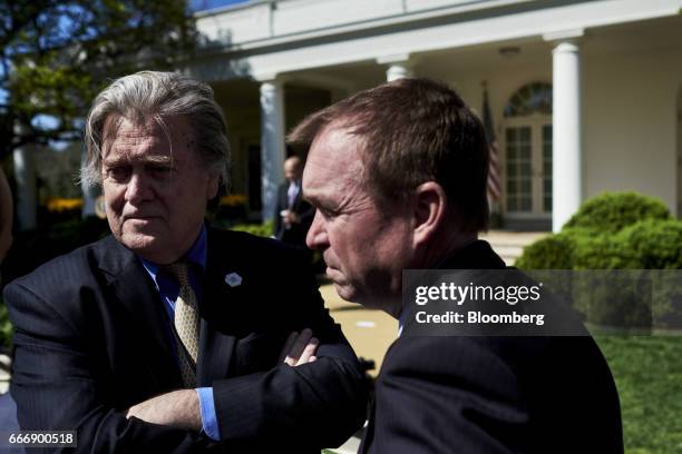 Steve Bannon, chief strategist for U.S. President Donald Trump, left, and Mick Mulvaney, director of the Office of Management and Budget , wait for...