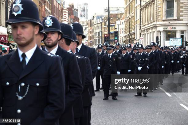 Police officers from across the country as well as thousands of Londoners gather to pay respect to PC Keith Palmer who was killed outside the Palace...