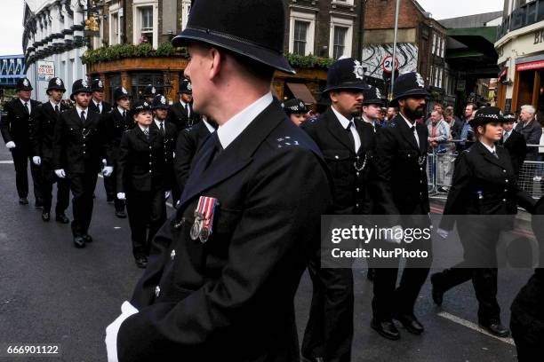 Police officers from across the country as well as thousands of Londoners gather to pay respect to PC Keith Palmer who was killed outside the Palace...