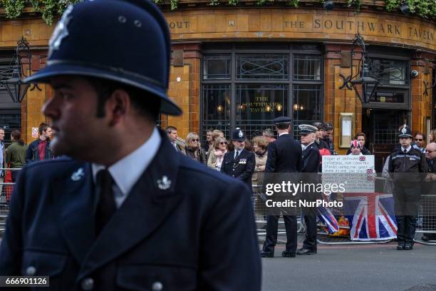 Police officers from across the country as well as thousands of Londoners gather to pay respect to PC Keith Palmer who was killed outside the Palace...