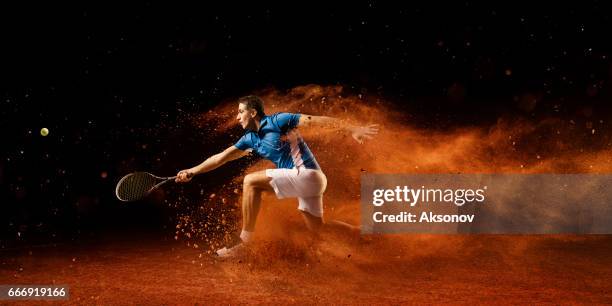 tennis: male sportsman in action - tennis quick stock pictures, royalty-free photos & images