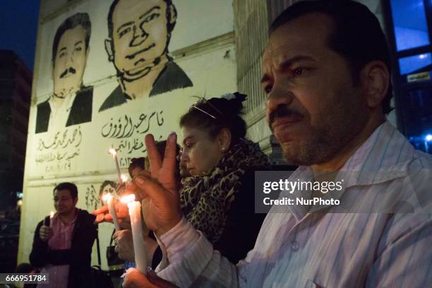 Demonstrated in Cairo, Egypt on 10 April 2017 by candles in front of the Journalists Syndicate to solidarity with the victims of the bombing of...