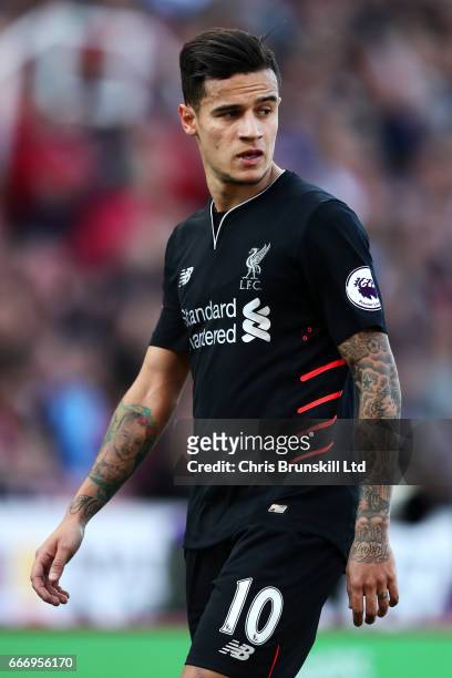 Philippe Coutinho of Liverpool looks on during the Premier League match between Stoke City and Liverpool at Bet365 Stadium on April 8, 2017 in Stoke...