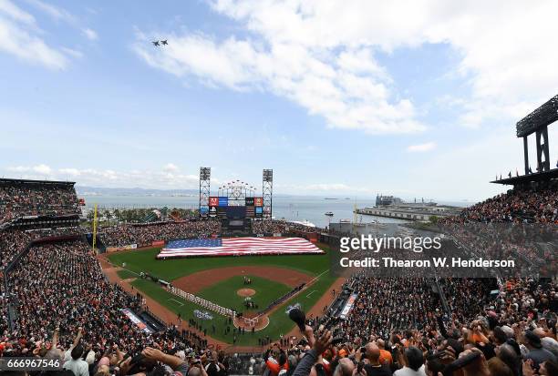 An overview of the inside of AT&T Park as the Arizona Diamondbacks and San Francisco Giants stand for the National Anthem prior to the start of their...