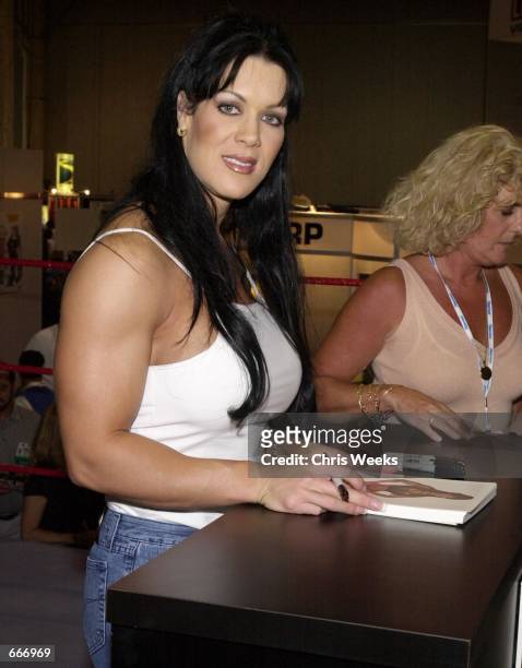 Female wrestler Chyna signs autographs at the Video Software Dealer's Association annual convention at the Venetian July 8, 2000 in Las Vegas, NV.