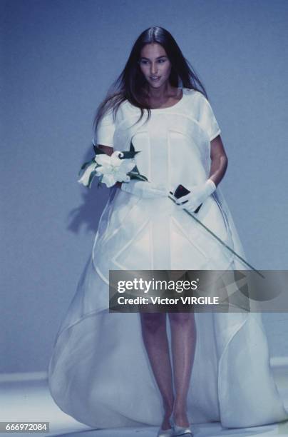 Vanessa Demouy walks the runway at the Jean-Charles de Castelbajac Ready to Wear Spring/Summer 1996 fashion show during the Paris Fashion Week in...