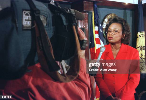 Anita Hill, Professor of Law, Social Policy and Women's Studies at Brandeis University, answers questions from reporters during a press conference at...