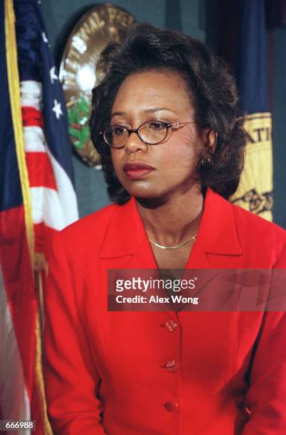 Anita Hill, Professor of Law, Social Policy and Women's Studies at Brandeis University, listens questions from reporters during a press conference at...